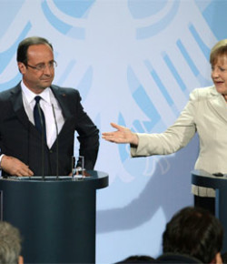 Merkel y Hollande reivindican la permanencia de Grecia en el euro