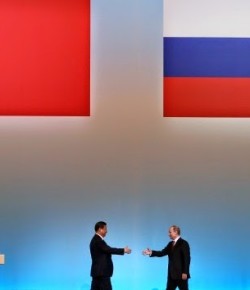 China y Rusia en acuerdos económicos anuncian la pronta caída del dólar